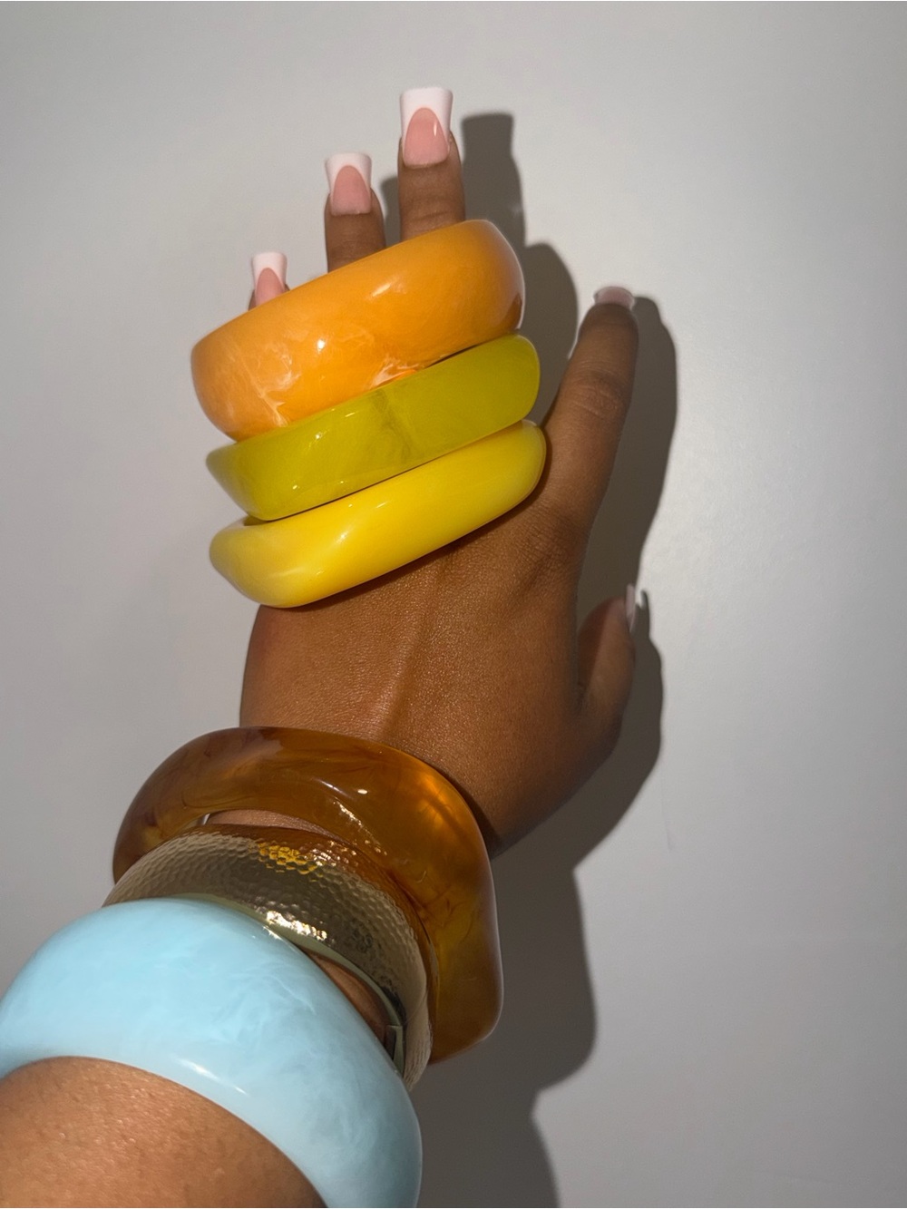 Three-Piece Resin Bangle Set in Orange, Lime, and Yellow